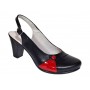 Pantofi eleganți de damă, tip slingback, cu toc gros stabil și design modern în combinație negru-roșu. Ideali pentru ținute office sau casual.